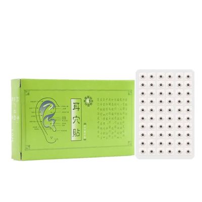 Thérapie auriculaire avec des graines d'oreille Vaccaria Appareil de médecine chinoise et complément à base de plantes traditionnel chinois