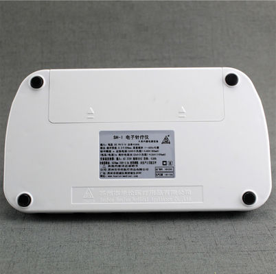 Appareil électronique d'acupuncture fonctionnant à batterie Appareil blanc pour l'acupuncture et le traitement de la relaxation musculaire